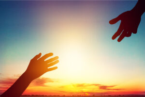 Help,Hand,On,Sunset,Background